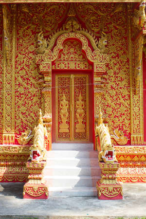 Traditional Thai style on door in temple Thailand のeditorial素材