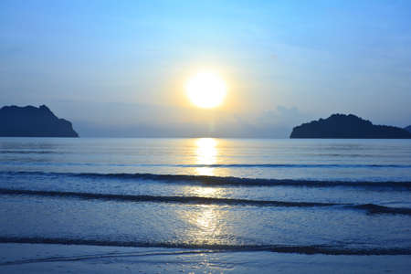 morning on the beach with sunrise  の写真素材