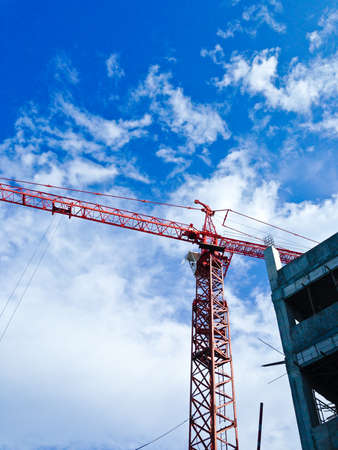 Concrete formwork and crane on construction site の写真素材