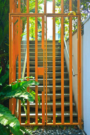 close & lock yellow metal barrier or gate 