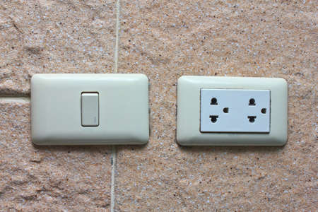 White electric socket   switch on the wallの写真素材