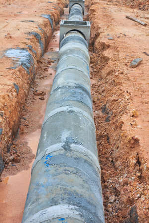 The Concrete drainage tank on construction siteの写真素材