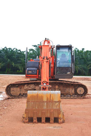 Heavy Duty Construction Equipment Parked at Worksiteの写真素材
