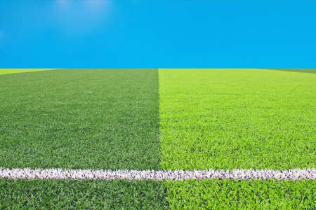 Soccer or football field with blue skyの写真素材