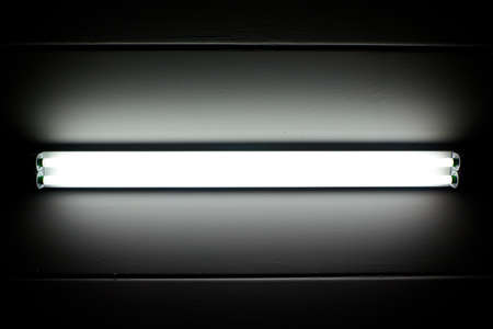 a fluorescent tube mounted on a wallの写真素材