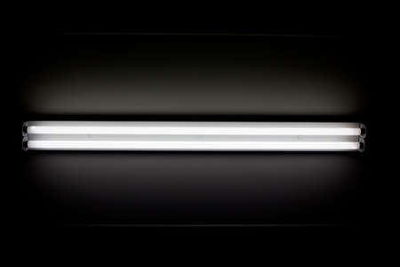 a fluorescent tube mounted on a wallの写真素材