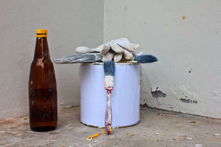 set of painter tool front of old white wallの写真素材