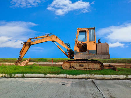 Heavy Duty Construction Equipment Parked at Worksiteの写真素材