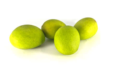 Green mango isolated on a white の写真素材