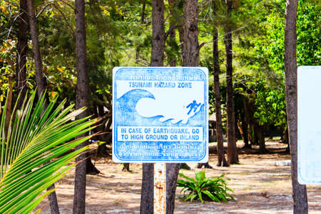 Tsunami Evacuation Sign near a beach in Thailand の写真素材