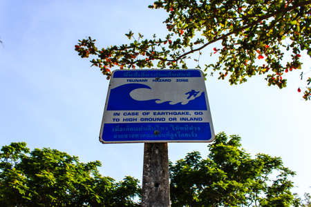 Tsunami Evacuation Sign near a beach in Thailand の写真素材