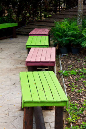 summer garden with wooden furniture 