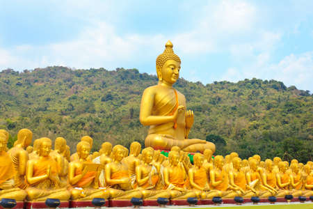 Many buddha statue under blue sky in temple, Nakornnayok , Thailand の写真素材