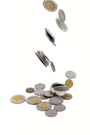 Heap of Thai coins falling to the groundの写真素材