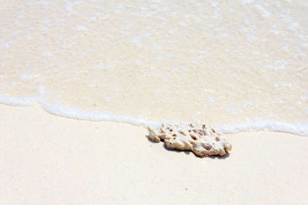 Blue water texture with small stones