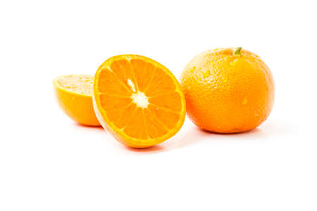 Sliced orange fruit on the white backgroundの写真素材