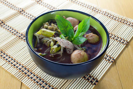 noodle of traditional thai food in black bowlの写真素材