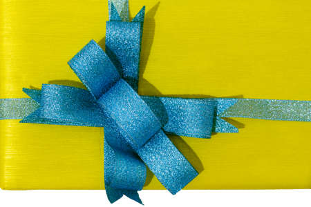 Yellow Gift Box with the Blue Ribbonの写真素材