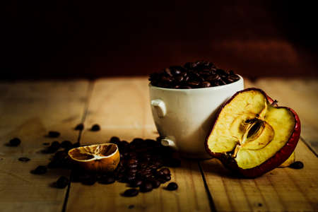 Rot and withered Fruits,On wooden plateの写真素材