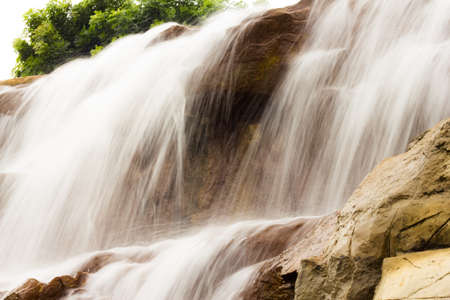 photography of beautiful waterfall on the rocksの写真素材