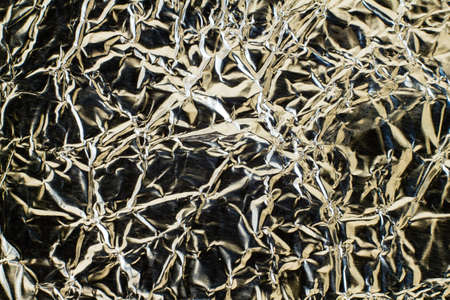 Close up of aluminum foil background (macro)の写真素材