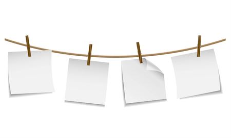 Blank white paper hanging on clothesline with clothespinのイラスト素材