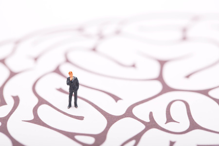 Businessman trapped in brain mazeの写真素材