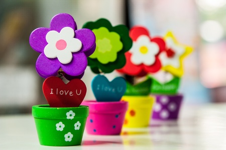 Colorful wood flowers with clip in  vaseの写真素材