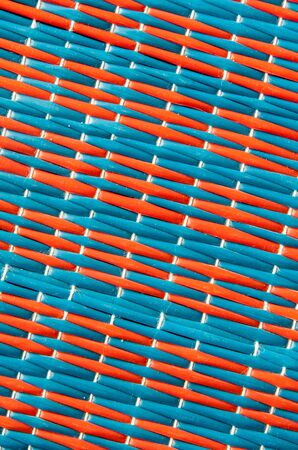 Two color of woven plastic mat,red and blueの写真素材