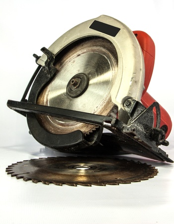 The circular saw is a machine using a toothed metal cutting disc or bladeの写真素材