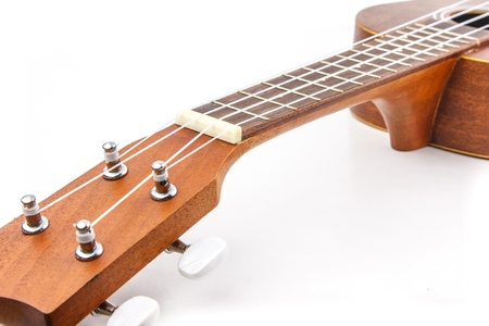 Close up of ukulele on white backgroundの写真素材