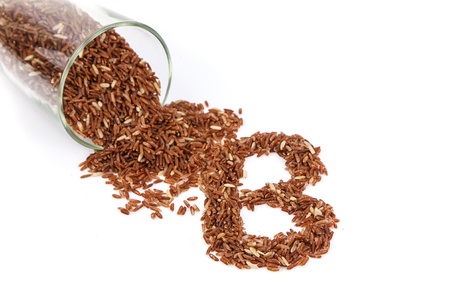 Coarse rice grain arrange as "B" on white backgroundの写真素材