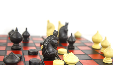 Chess board with chess pieces show black check and win the game