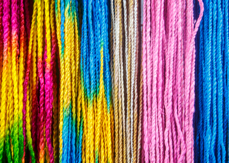 Many colorful mulberry rope - nature and handmade  arrange in vertical