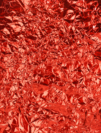 Red shiny wrinkle foil paperの写真素材