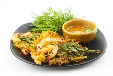 Thai food - Shrimp fried with polyscias vegetable and curryの写真素材