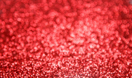 Red blur abstract  bokeh background - shiny and beautifulの写真素材