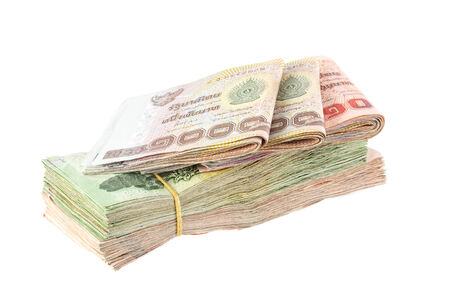 Heap of Thai baht banknote isolated on white background