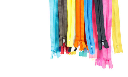 Colorful  zipper - sewing object  hang   on white backgroundの写真素材