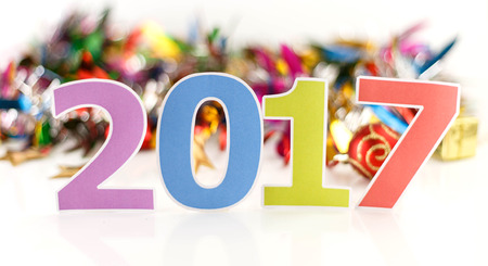Happy new year 2017 - text and decoration  on white  background