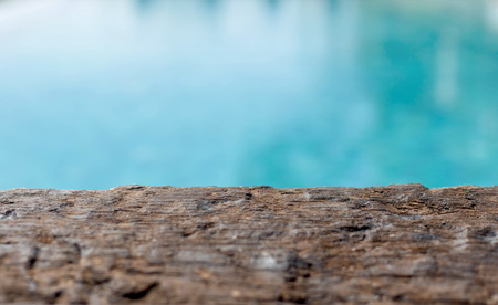 Blur background - brown wooden and blue sea backgroundの写真素材