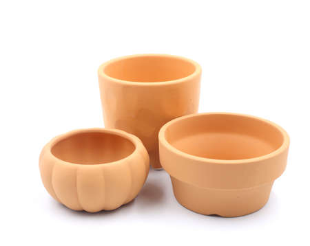 Group of beautiful clay flower pot on white background