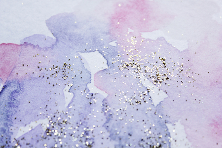 Abstract watercolor glittery background. Dreamy, blurred, magical backdrop. Elegant, feminine, soft light, golden abstraction.の写真素材