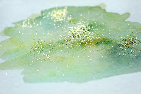 Abstract watercolor glittery background. Dreamy, blurred, magical backdrop. Elegant, feminine, soft light, golden abstraction.の写真素材