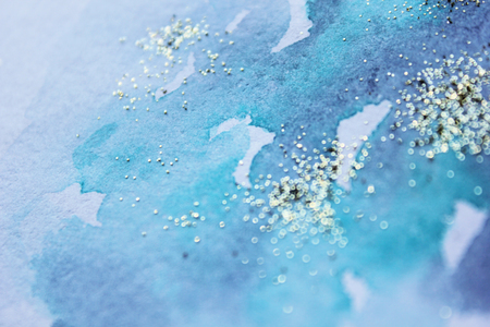 Abstract watercolor glittery background. Dreamy, blurred, magical backdrop. Elegant, feminine, soft light, golden abstraction.の写真素材