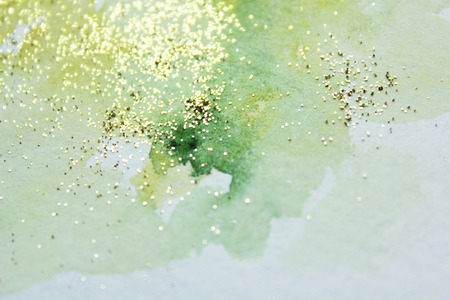 Abstract watercolor glittery background. Dreamy, blurred, magical backdrop. Elegant, feminine, soft light, golden abstraction.の写真素材