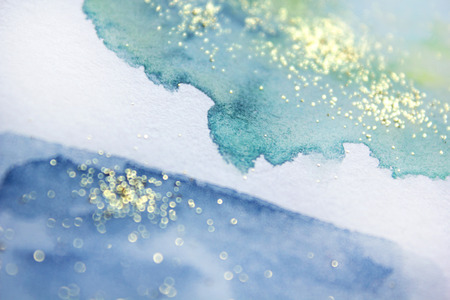 Abstract watercolor glittery background. Dreamy, blurred, magical backdrop. Elegant, feminine, soft light, golden abstraction.の写真素材