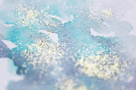 Abstract watercolor glittery background. Dreamy, blurred, magical backdrop. Elegant, feminine, soft light, golden abstraction.の写真素材