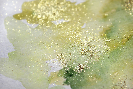 Abstract watercolor glittery background. Dreamy, blurred, magical backdrop. Elegant, feminine, soft light, golden abstraction.の写真素材