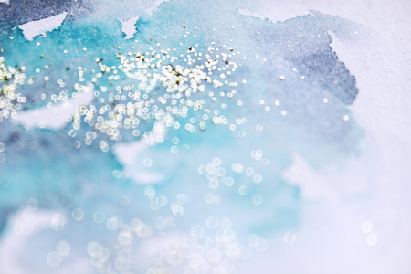 Abstract  glittery background. Dreamy, blurred, magical backdrop. Elegant, feminine, soft light, golden abstraction.の写真素材
